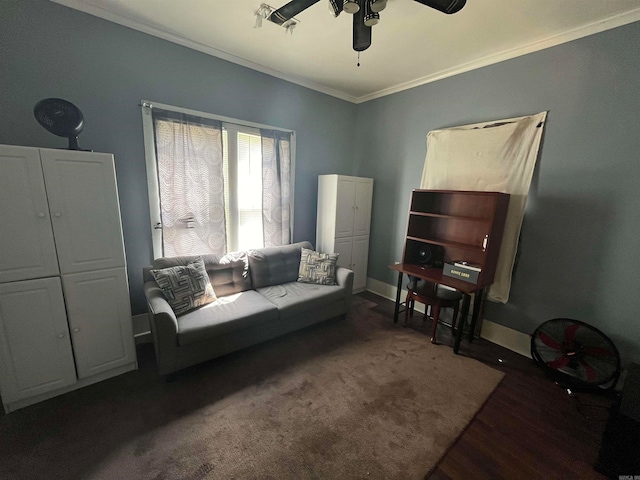 living room with ceiling fan, dark wood-type flooring, and crown molding