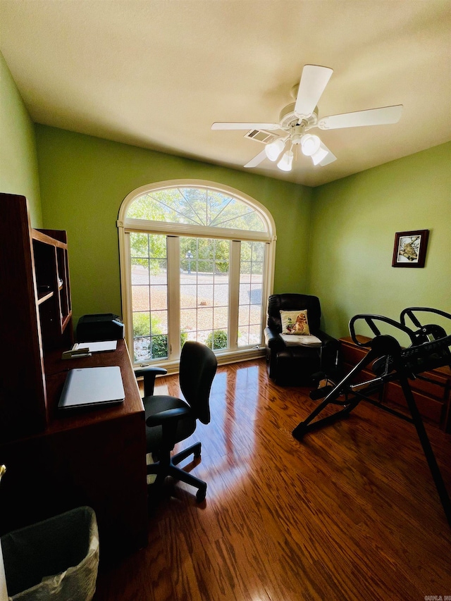 home office with ceiling fan and hardwood / wood-style flooring