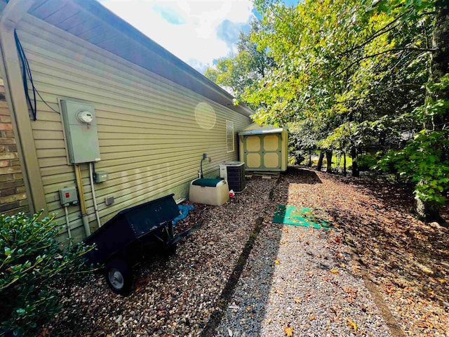 view of home's exterior featuring central AC unit