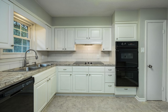 kitchen featuring black appliances, backsplash, sink, and white cabinets