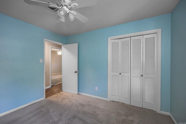 full bathroom featuring tile patterned flooring, tiled shower / bath, vanity, and toilet