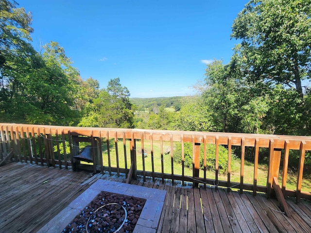 deck featuring a lawn