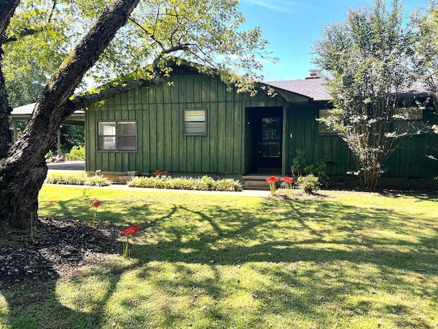 exterior space with a lawn