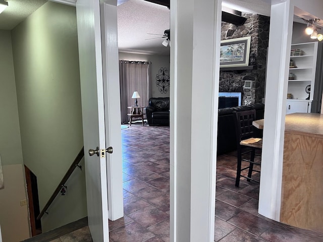 236 N Riverview Ln, Mountain View, AR 72560 - corridor with an upstairs landing and a textured ceiling