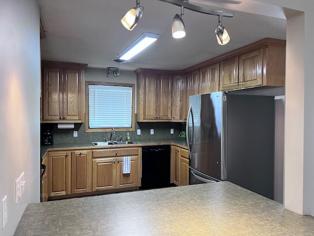 236 N Riverview Ln, Mountain View, AR 72560 - kitchen with freestanding refrigerator, dishwasher, a sink, and decorative backsplash