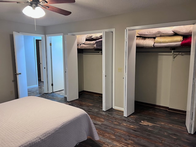 bedroom featuring ceiling fan, a textured ceiling, and dark wood-type flooring