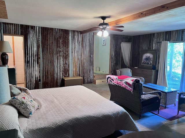 236 N Riverview Ln, Mountain View, AR 72560 - bedroom with carpet, wood walls, a ceiling fan, and beam ceiling