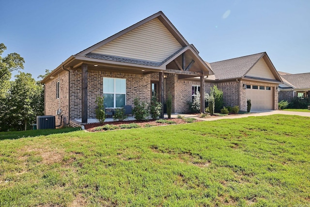 view of front facade featuring central AC, a garage, and a front lawn