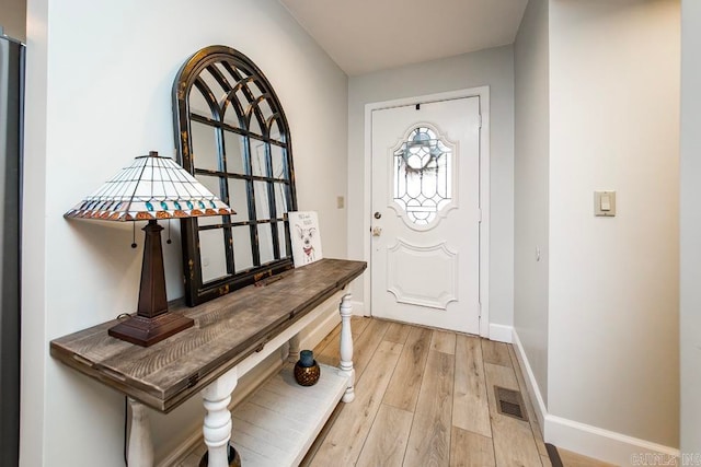 entrance foyer featuring light hardwood / wood-style flooring