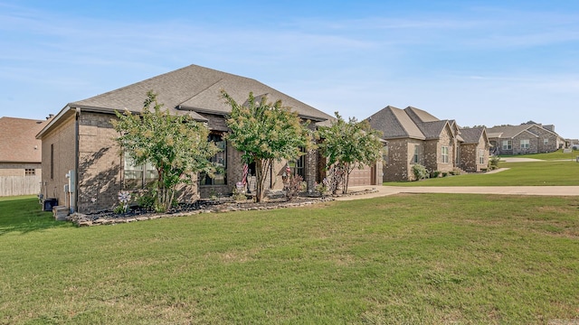 french country style house featuring a front yard