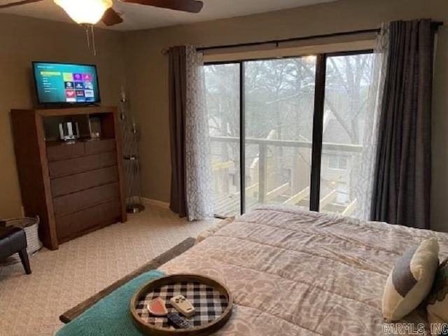 carpeted bedroom featuring access to outside and ceiling fan