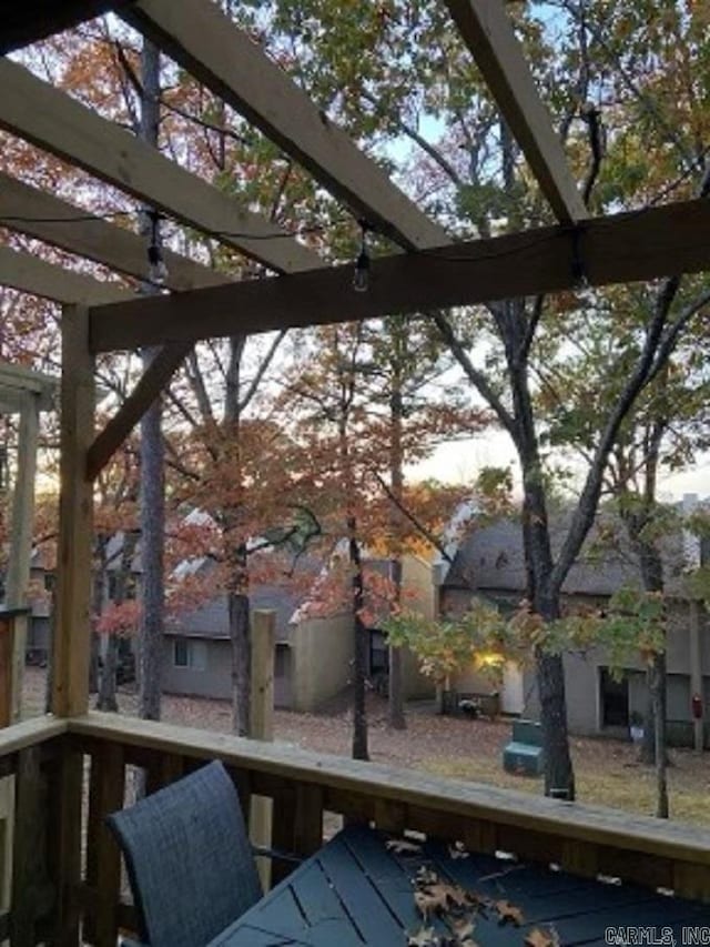 wooden deck with a pergola