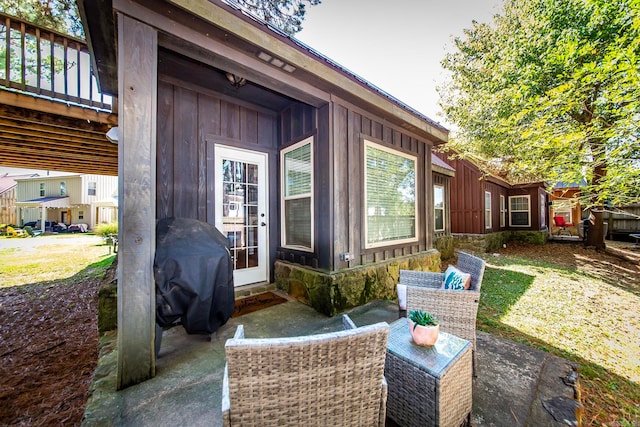 view of patio featuring a grill