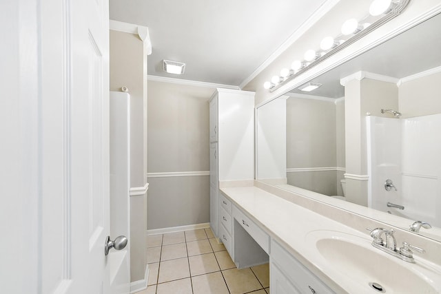 bathroom with crown molding, tile patterned flooring, vanity, and toilet