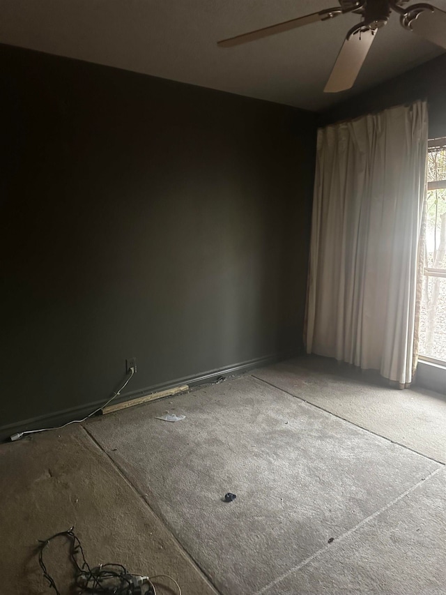 unfurnished room featuring ceiling fan