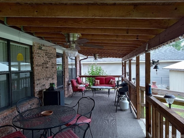 view of patio / terrace featuring ceiling fan