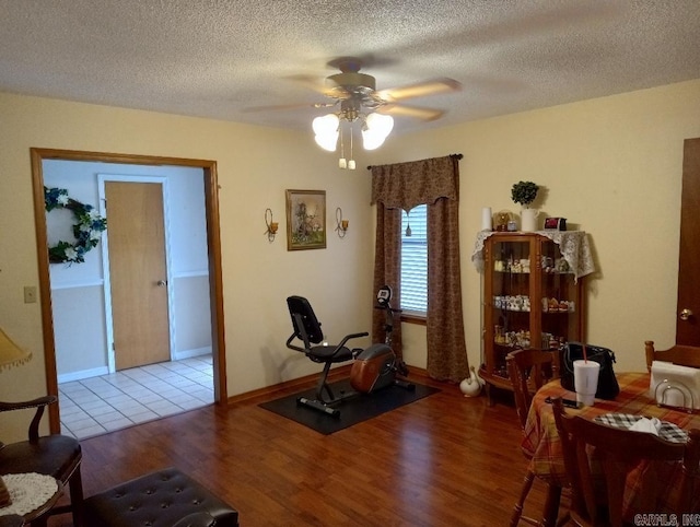 2804 Jerry Lee, Mena, AR 71953 - interior space with baseboards, wood finished floors, a textured ceiling, and ceiling fan
