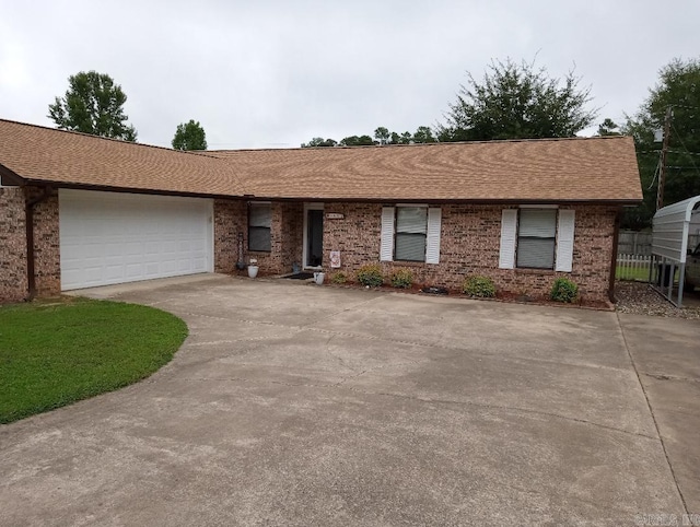 ranch-style home featuring a garage