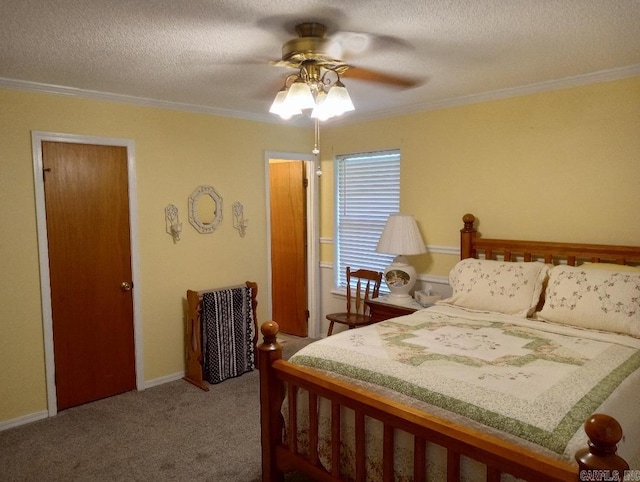 bedroom featuring ornamental molding, ceiling fan, carpet flooring, and a textured ceiling