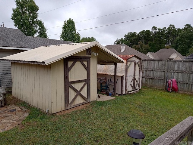 view of outdoor structure featuring a yard