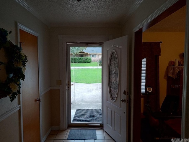 2804 Jerry Lee, Mena, AR 71953 - entryway featuring a textured ceiling, crown molding, and light tile patterned floors