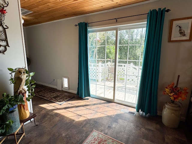 doorway featuring hardwood / wood-style flooring and wood ceiling