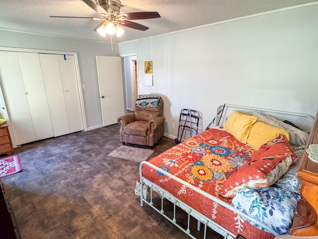 bedroom with a closet, ceiling fan, and a textured ceiling