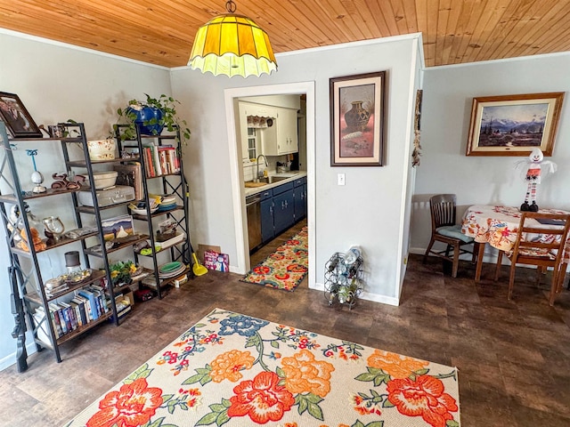 interior space featuring wood ceiling and sink