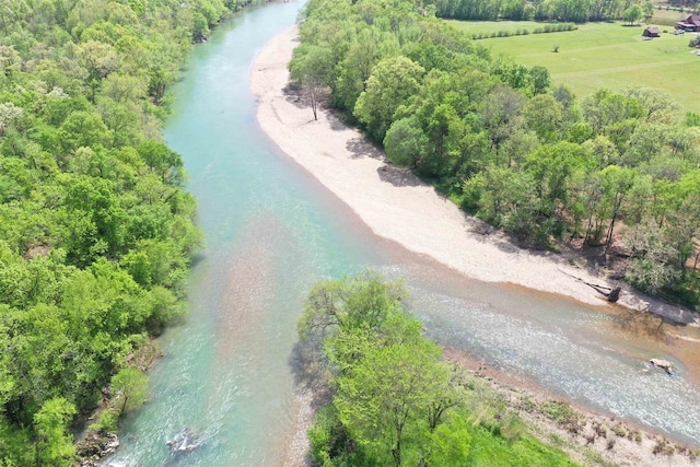 aerial view featuring a water view and a beach view