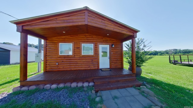 exterior space featuring a rural view and a lawn