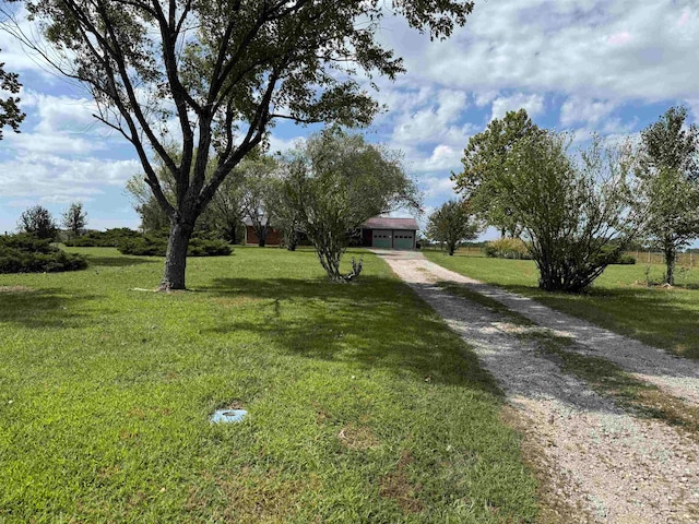 view of yard with a garage