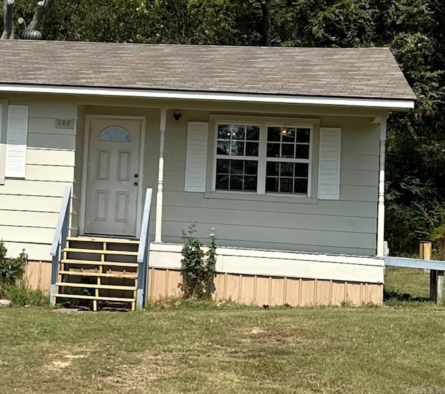 exterior space featuring a front lawn