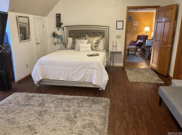 3409 Ramsgate, Fort Smith, AR 72908 - bedroom with baseboards, lofted ceiling, and wood finished floors