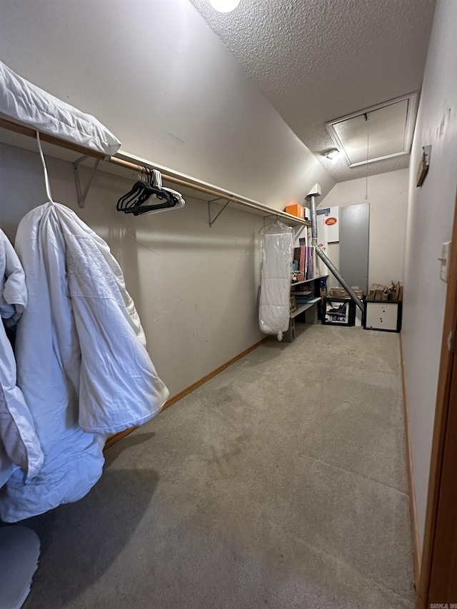 3409 Ramsgate, Fort Smith, AR 72908 - walk in closet with attic access, vaulted ceiling, and carpet