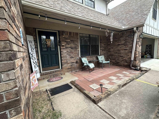3409 Ramsgate, Fort Smith, AR 72908 - property entrance featuring covered porch, brick siding, and roof with shingles