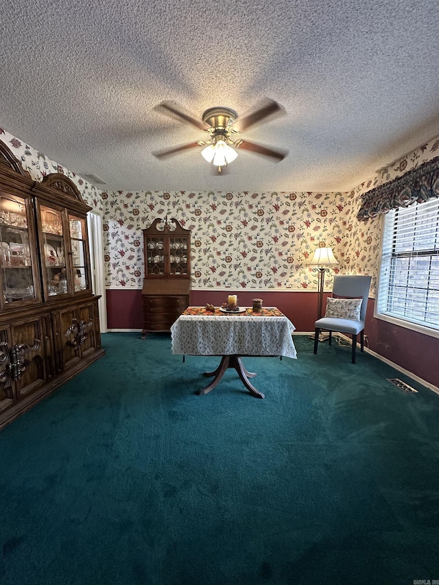 3409 Ramsgate, Fort Smith, AR 72908 - interior space featuring carpet floors, a textured ceiling, wallpapered walls, and a ceiling fan