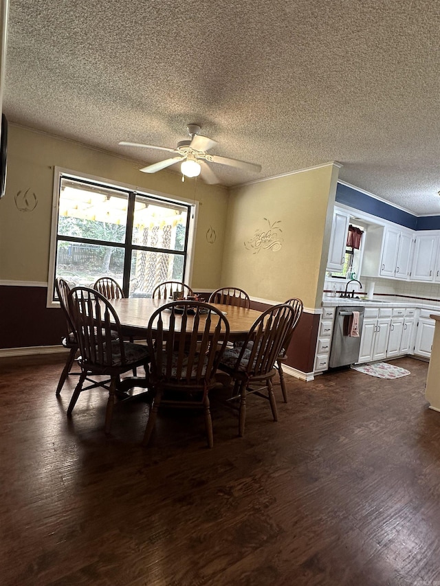 3409 Ramsgate, Fort Smith, AR 72908 - dining area featuring a ceiling fan, a textured ceiling, and dark wood finished floors