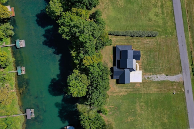 birds eye view of property with a rural view