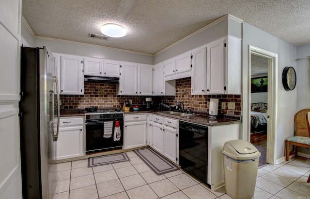 kitchen featuring white cabinets, light tile patterned floors, sink, backsplash, and black appliances