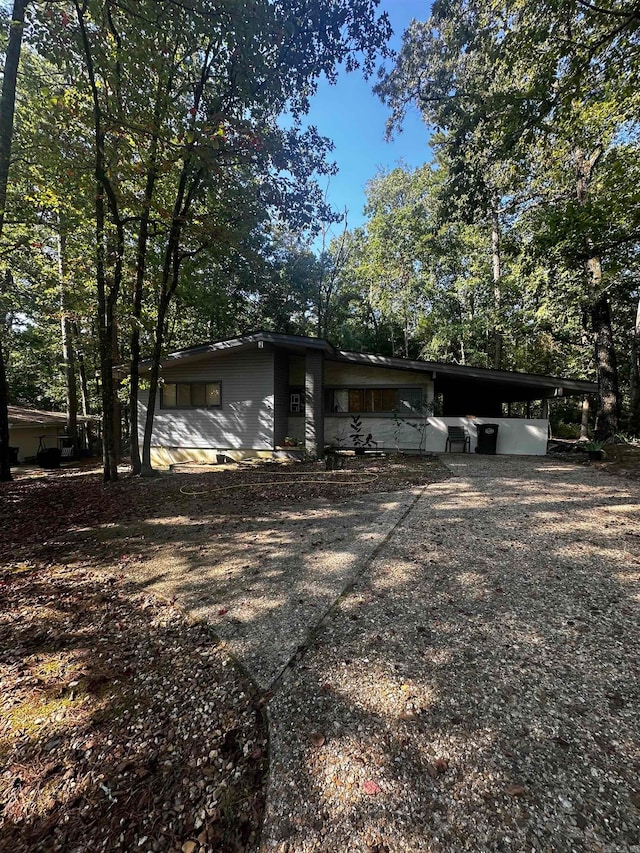 view of front of house with a carport