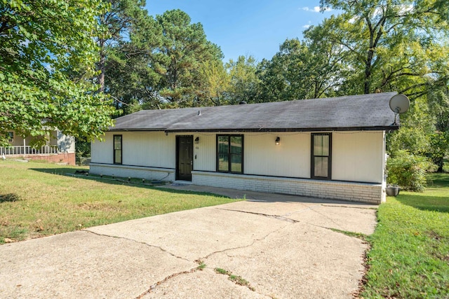 single story home with a front yard and a porch