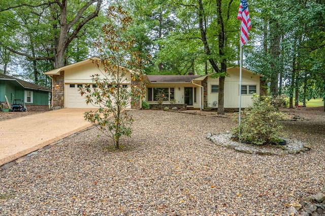 single story home featuring a garage