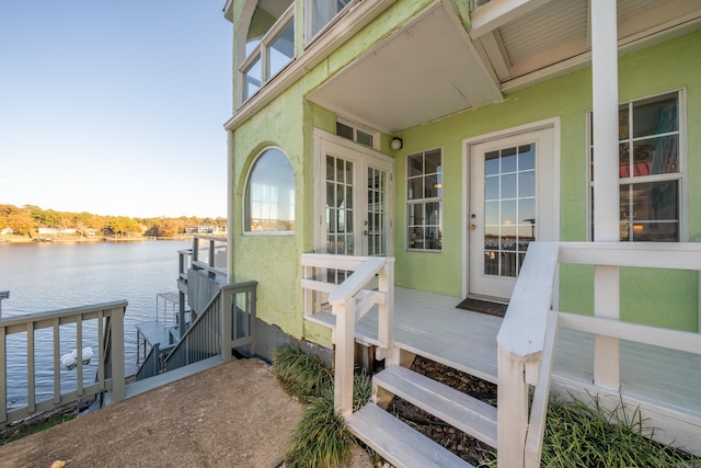 301 Kleinshore # 8, Hot Springs, AR 71913 - property entrance featuring stucco siding and a deck with water view