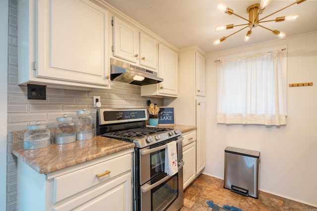 301 Kleinshore # 8, Hot Springs, AR 71913 - kitchen featuring double oven range, under cabinet range hood, tasteful backsplash, baseboards, and white cabinets