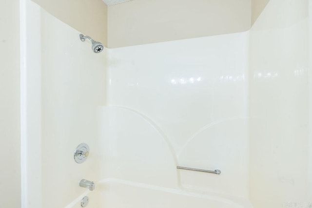 bathroom with shower / tub combination