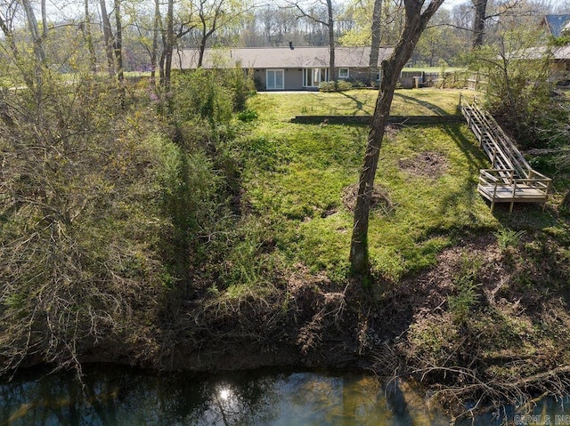 view of yard with a water view