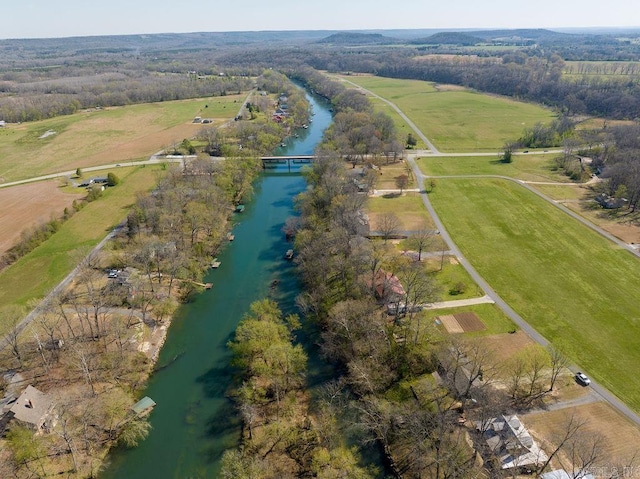 drone / aerial view with a rural view and a water view