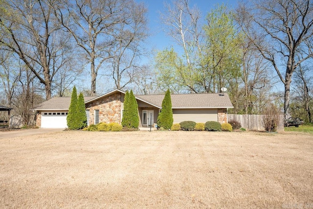 ranch-style home with a garage