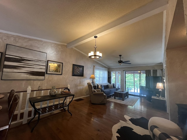 living room with a textured ceiling, wood finished floors, ornamental molding, ceiling fan with notable chandelier, and vaulted ceiling with beams