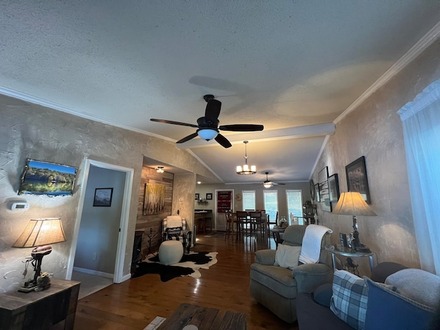 living room featuring a textured ceiling, dark wood-type flooring, vaulted ceiling with beams, crown molding, and ceiling fan